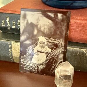 Antique tintype - baby in stroller